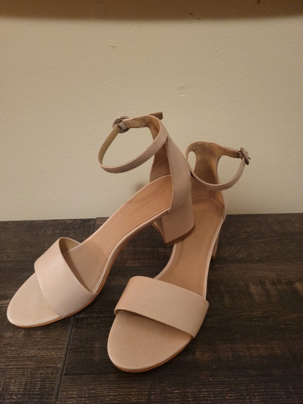 Bernardo nude leather ankle strap sandals with a block heel and buckle closure